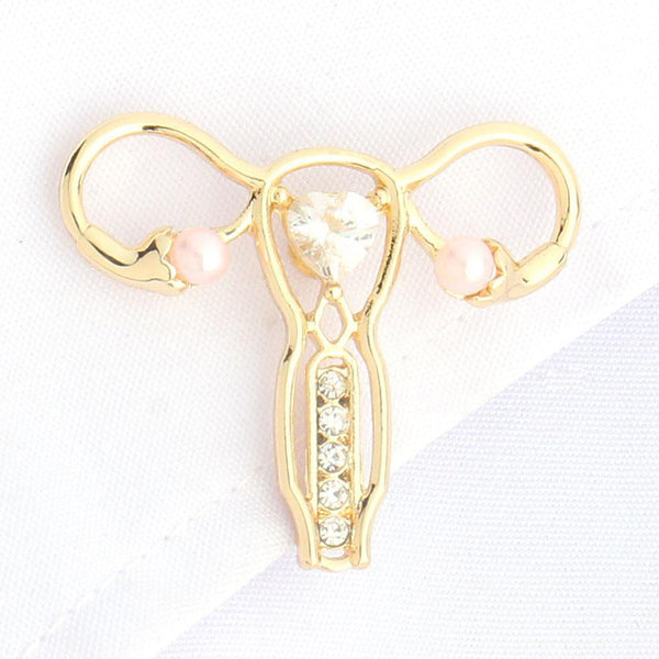 idée cadeau aide soignante bijou en forme d'utérus argenté